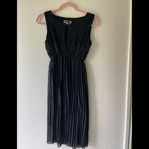 New gorgeous pleated black dress. Size S